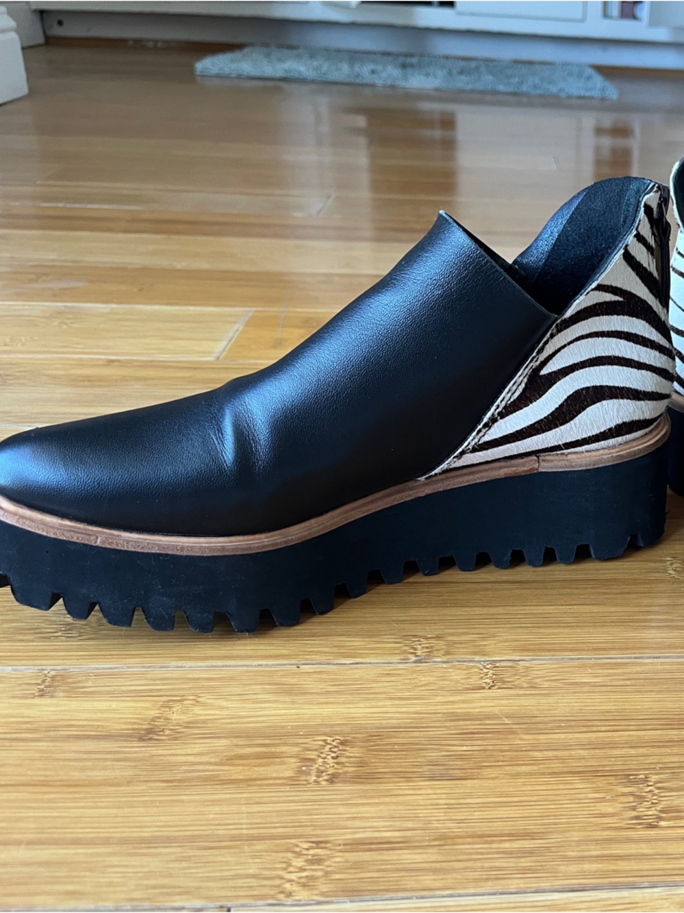 Black Leather Platform leather lug sole booties with Zebra Accent